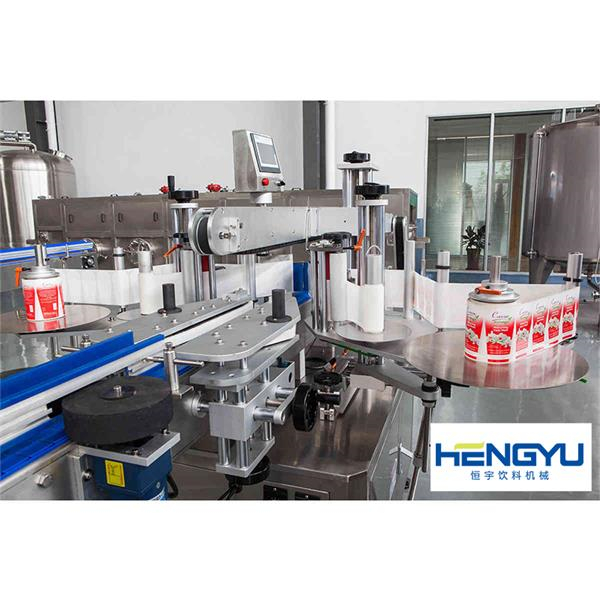 Automatic adhesive labeling machine for the plastic bottle 
